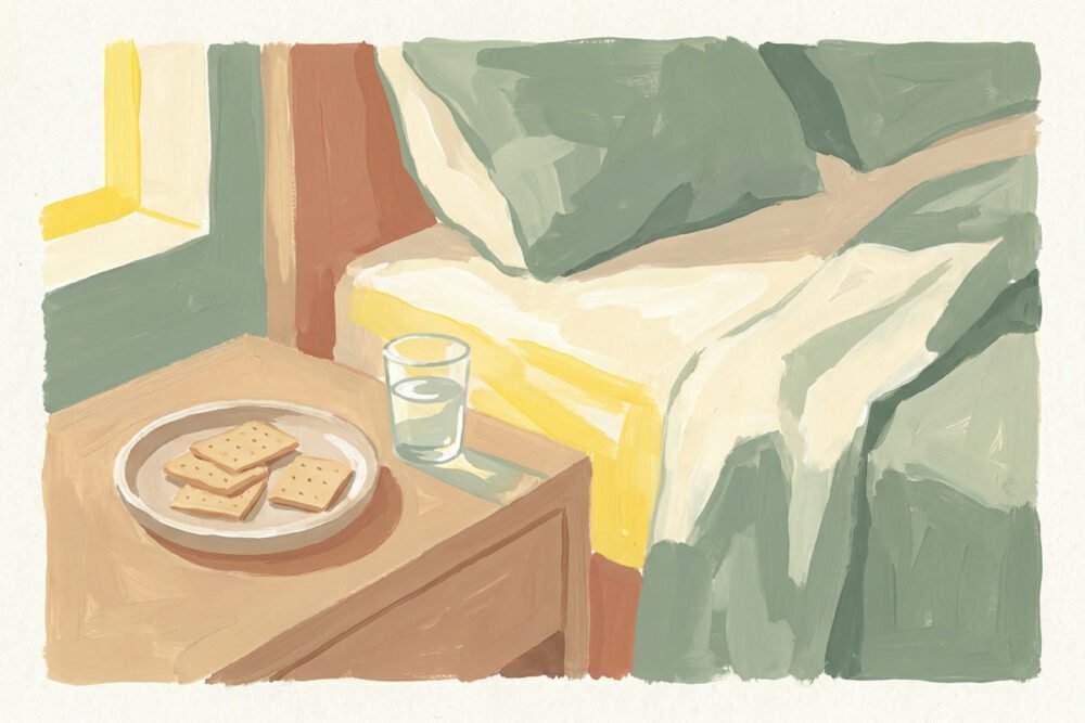 Gouache illustration of a small plate of crackers and a glass of water on a wooden nightstand beside an unmade bed in soft morning light.